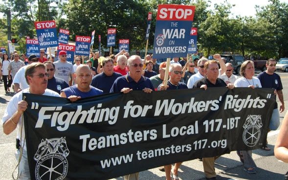 Teamsters President James Hoffa Jr attending a Teamsters rally. Tea Partiers protested the rally.