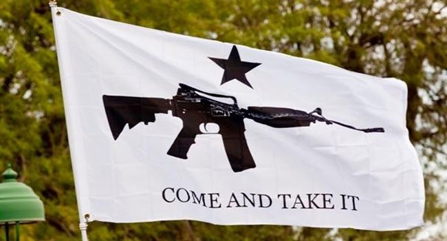 The "Come and Take it Flag" is flying alongside the Gadsden flag at a growing number of Tea Party rallies.