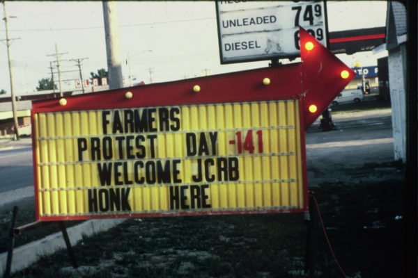 Sign welcoming Jewish Community Relations Bureau bus tour from Kansas City to support Chillicothe protest vigil (August 1986).